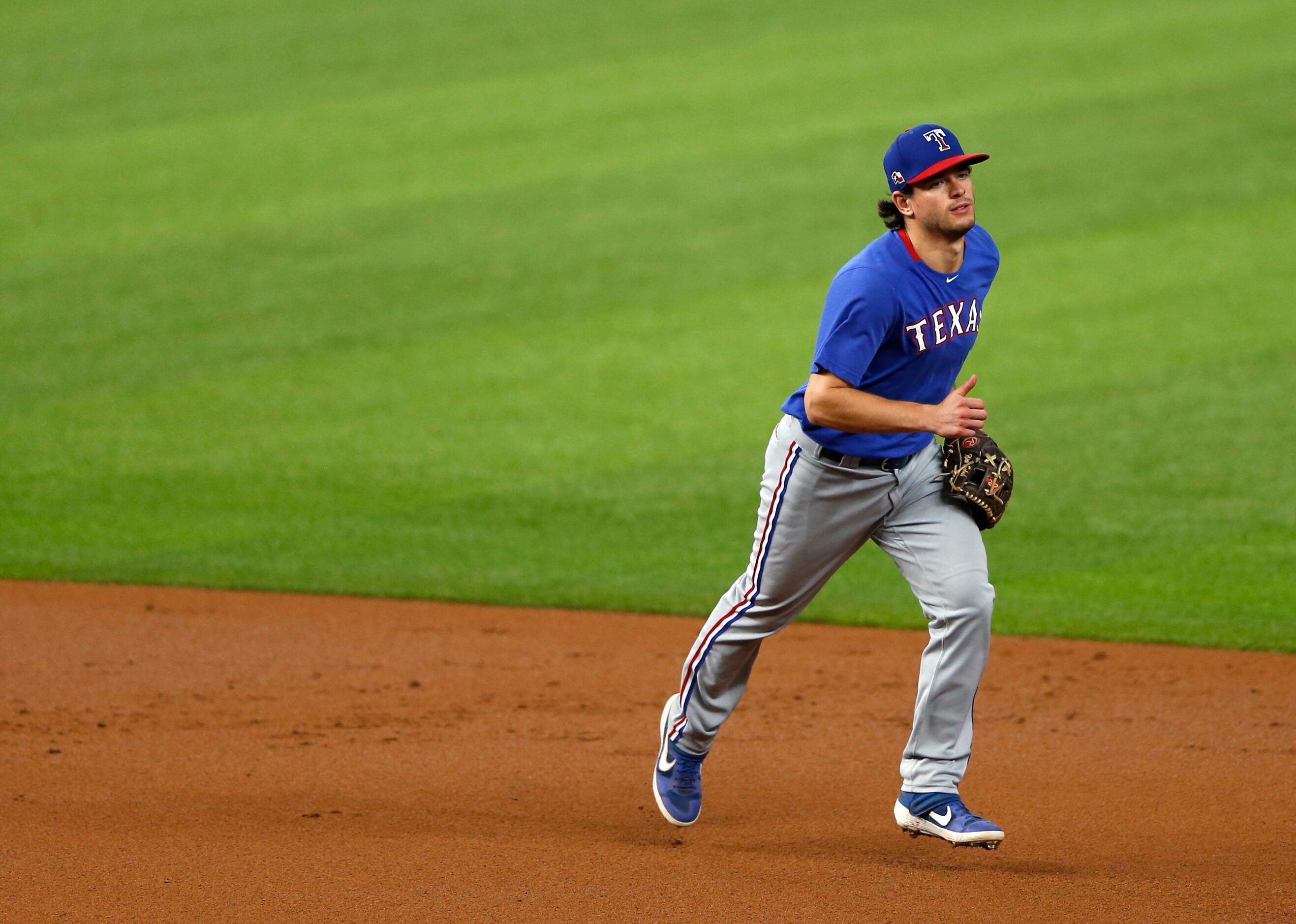 Texas Rangers Nick Solak (15) makes his way off the field during Texas Rangers 2020 Summer...