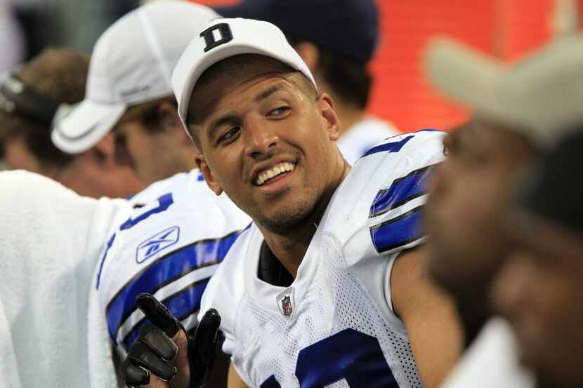 Dallas Cowboys wide receiver Miles Austin (19) is happy on the bench, as the Cowboys pull...