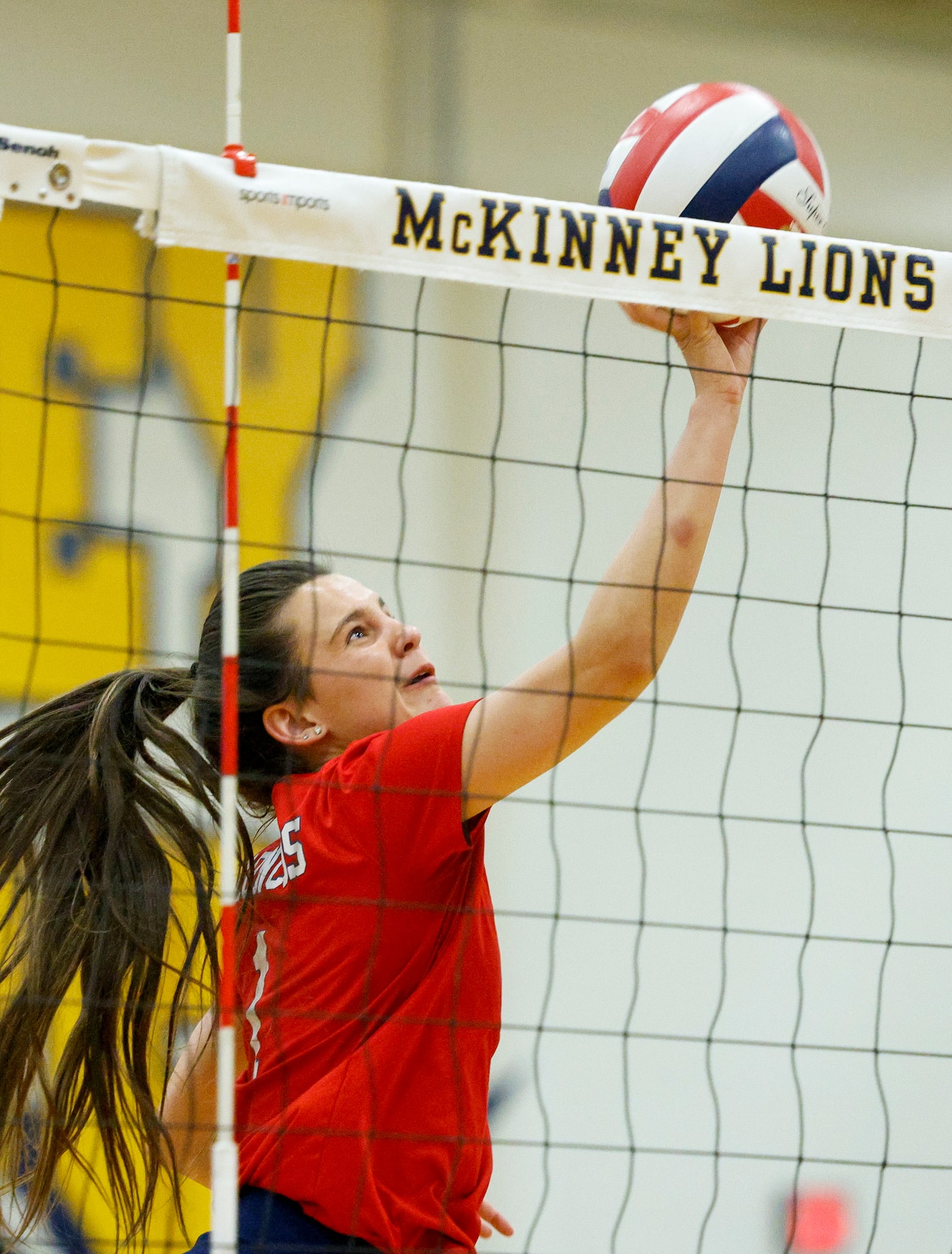 McKinney Boyd’s Carson Eickenloff (1) hits a shot over the net during a volleyball match...