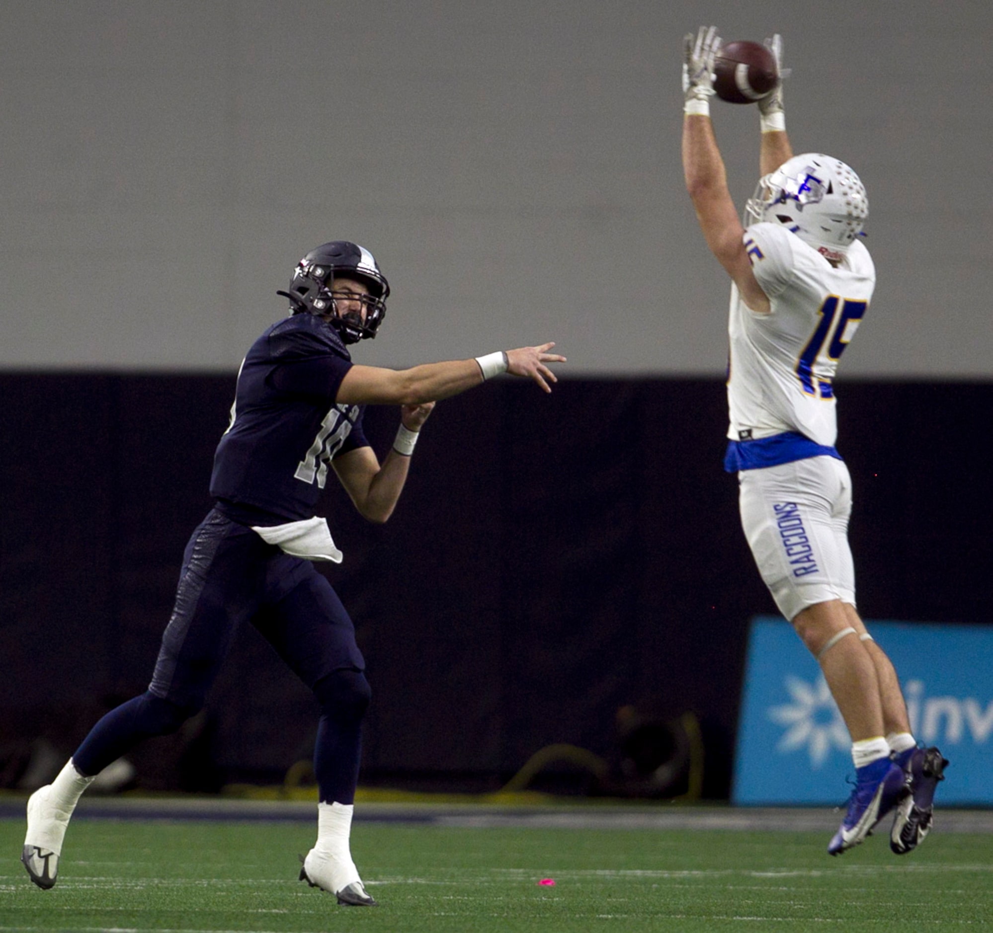 Frisco Lone Star quarterback Collin Blackstock (10), left, launches a pass downfield before...