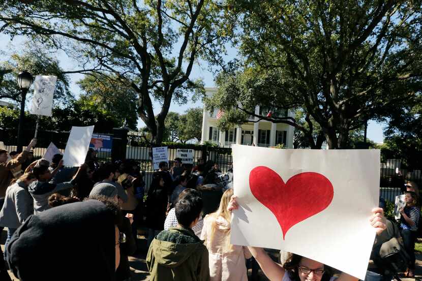 Members of The Syrian People Solidarity Group protested in front of the Governor's Mansion...
