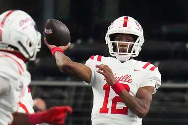 Duncanville quarterback Keelon Russell (12) throws a pass during the first half of the Class...