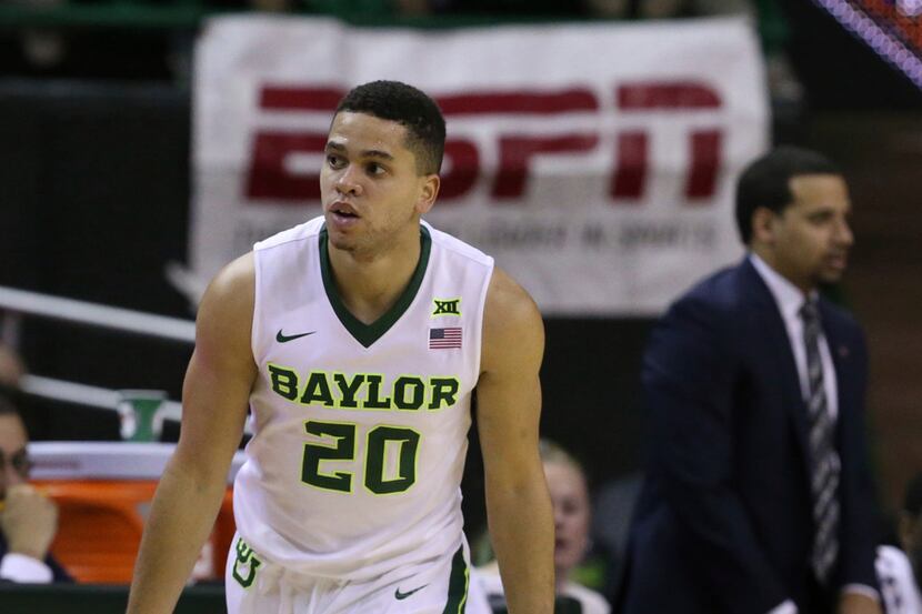 Baylor guard Manu Lecomte reacts to a 3-point shot over Wagner during the first half of an...