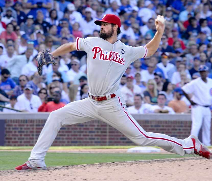 Philadelphia Phillies' starting pitcher Cole Hamels delivers during the ninth inning of a...