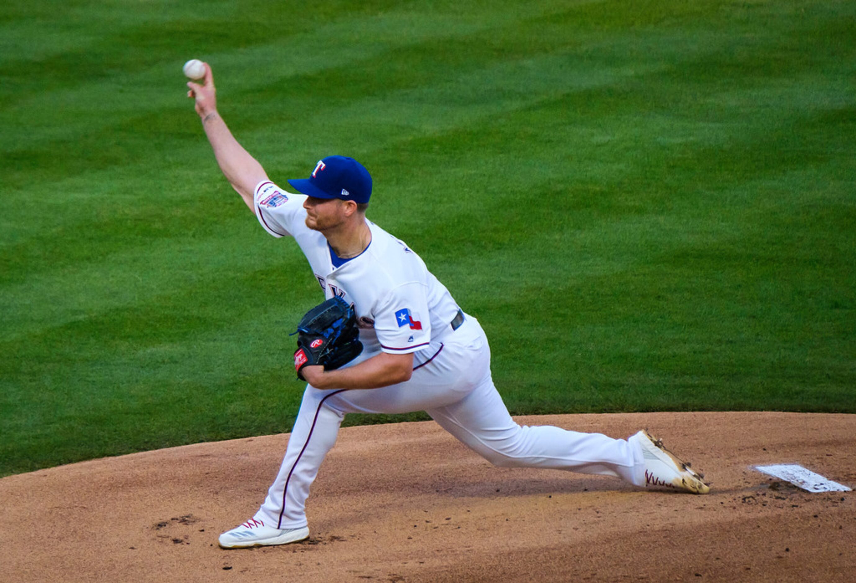 Texas Rangers pitcher Shelby Miller throws during the first inning against the Houston...