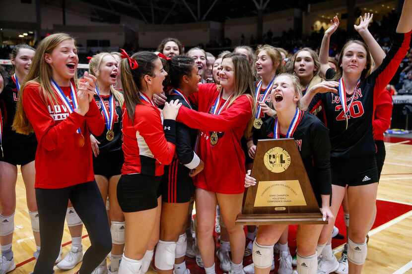 The Lucas Lovejoy Leopards celebrate after winning a class 5A volleyball state semifinal...