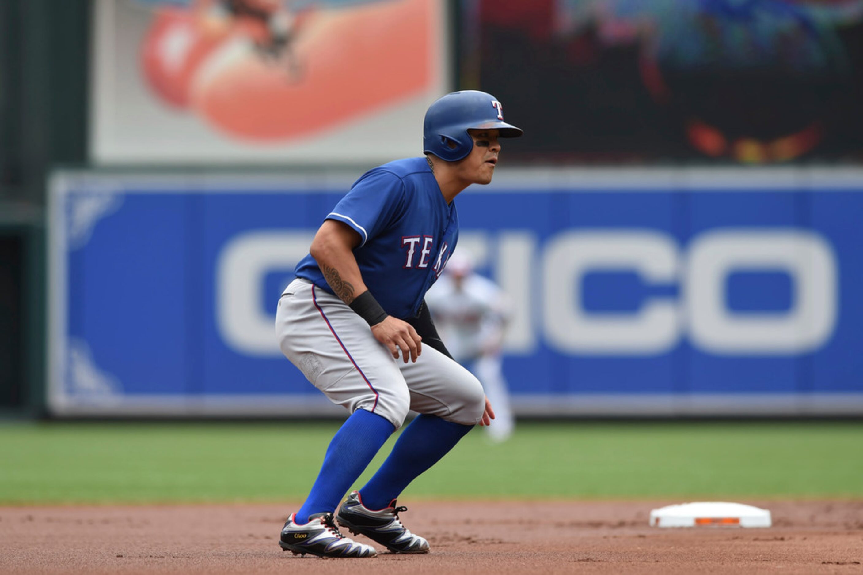 Texas Rangers' Shin-Soo Choo leads off at second against the Baltimore Orioles in the first...