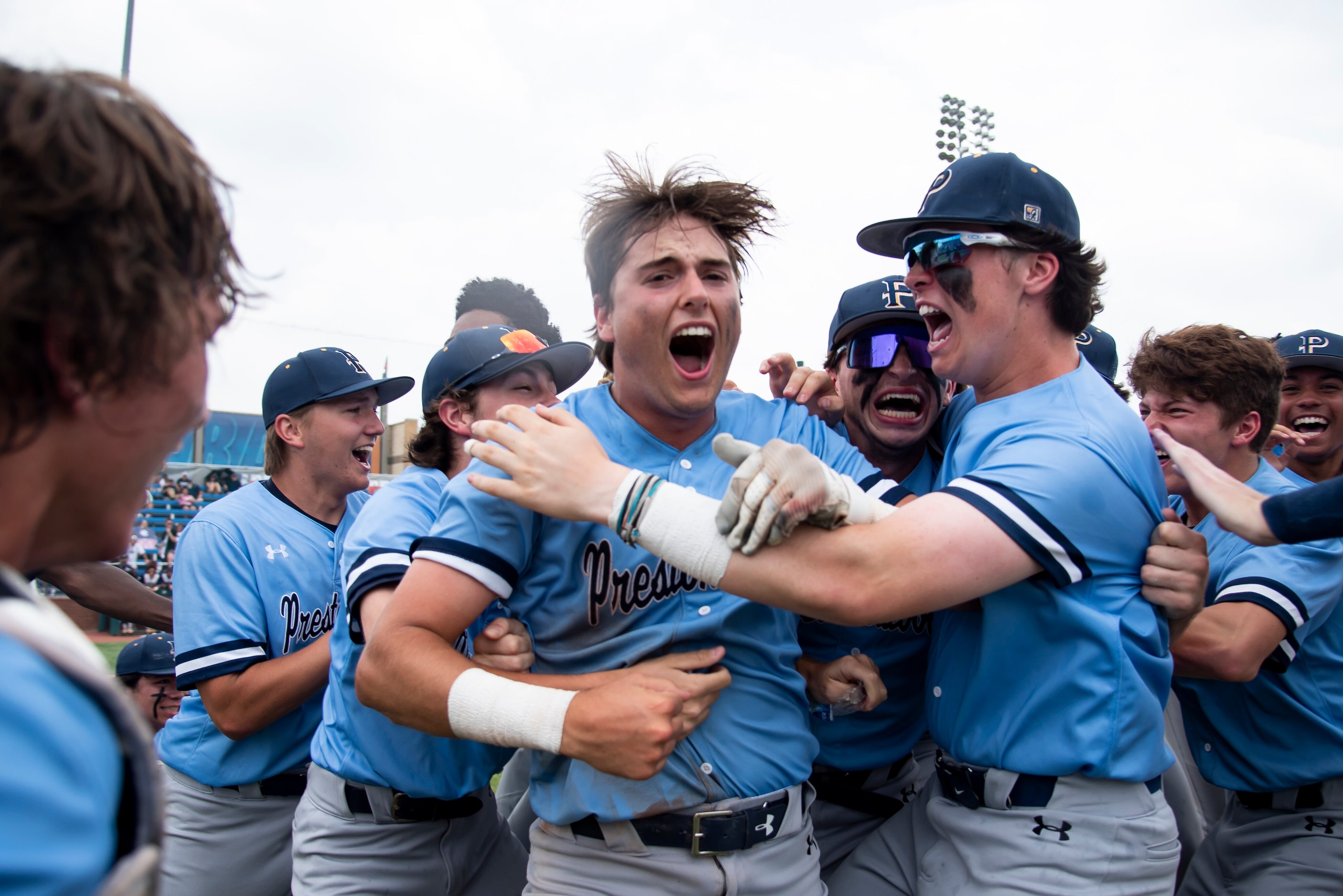 Prestonwood players celebrate after making the final out to win the TAPPS Division I...