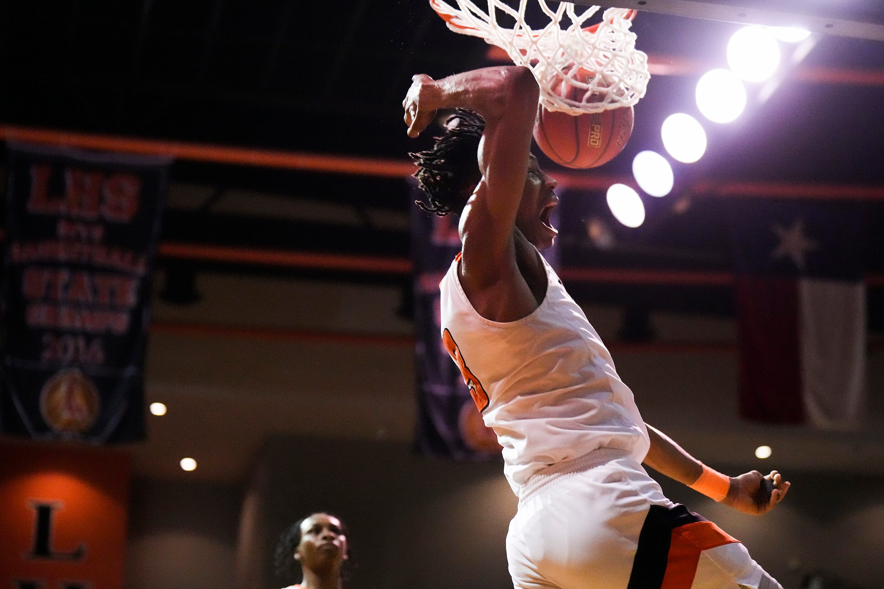 Lancaster's Joseph Mayberry III (3) dunks the ball during a boys high school basketball game...