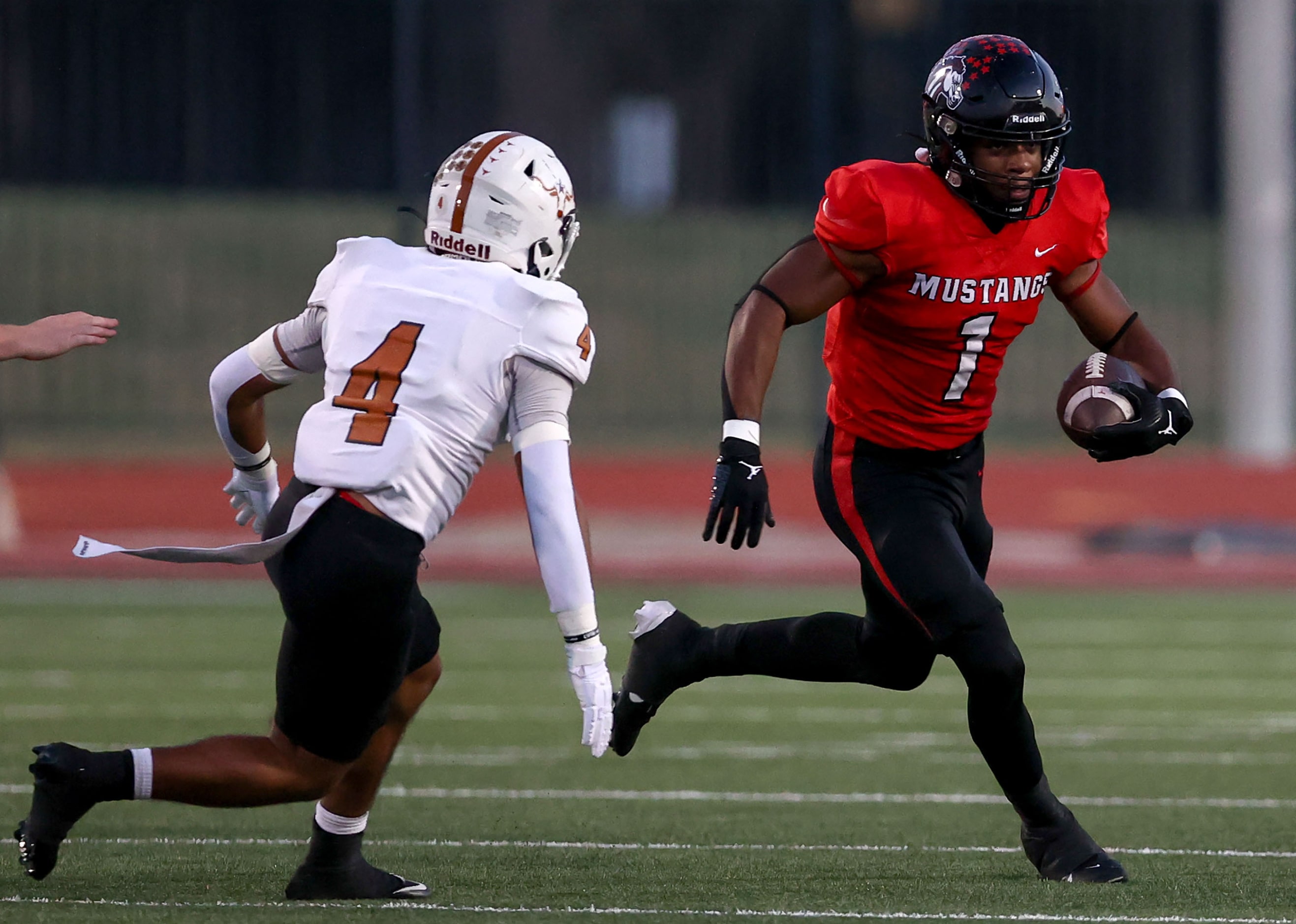 Creekview running back DeAndre Richardson (1) tries to get past W.T. White defensive back...