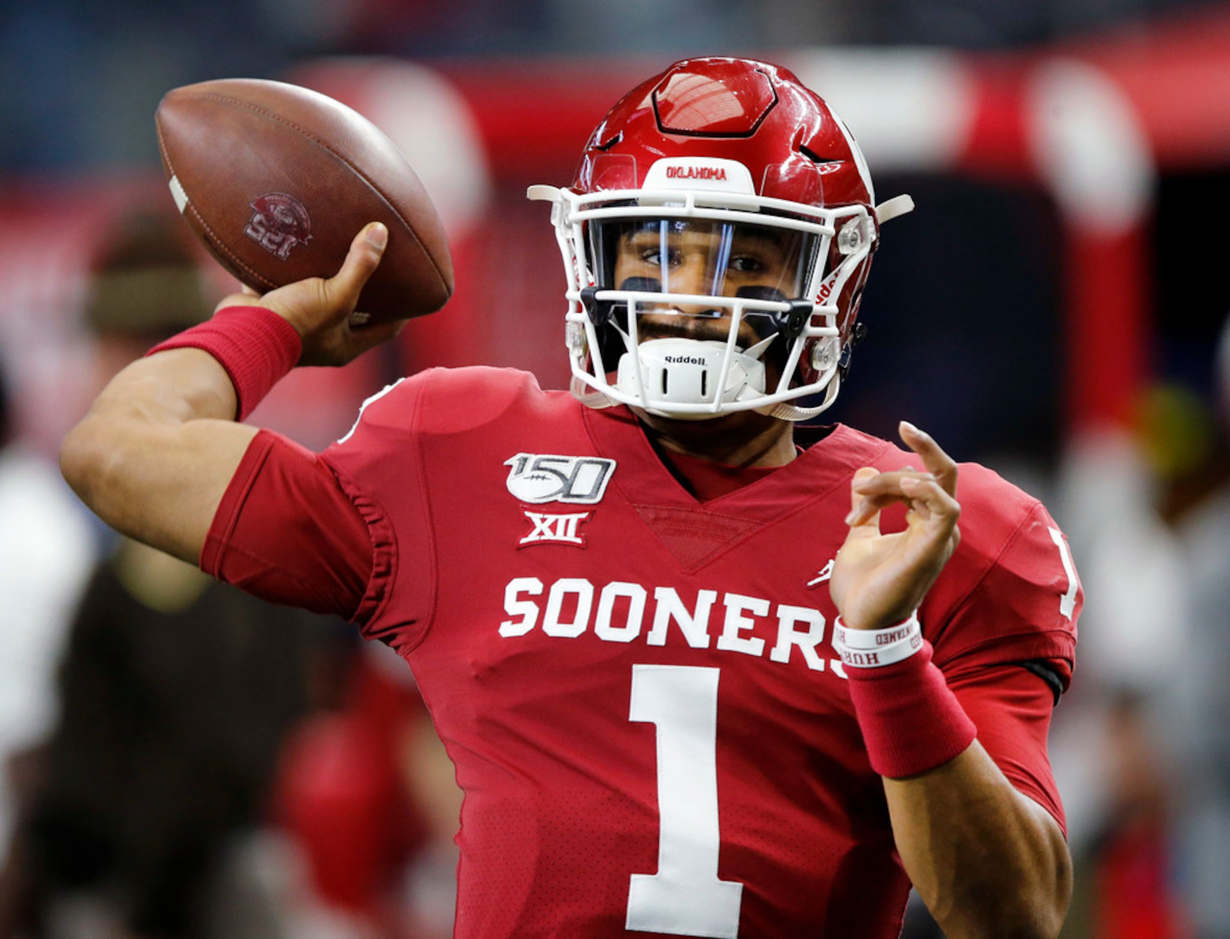 Oklahoma Sooners quarterback Jalen Hurts (1)  warms up his arm before facing the Baylor...