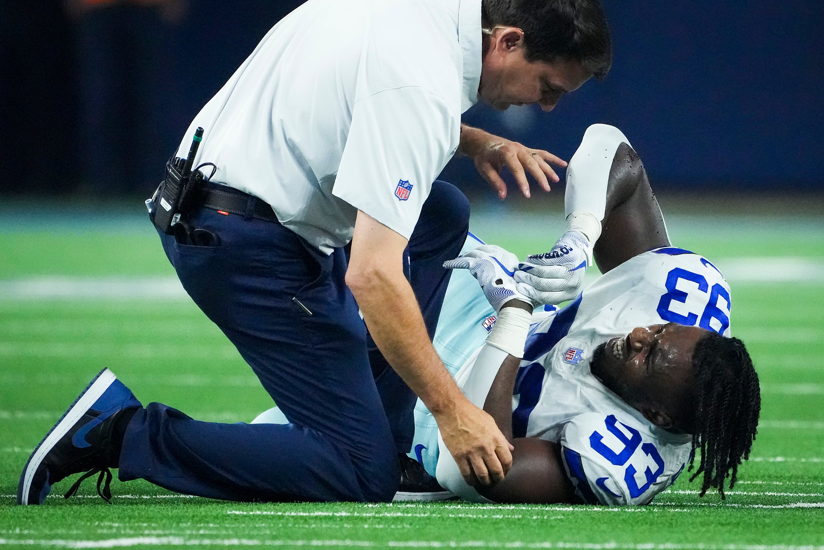 Dallas Cowboys defensive end Tarell Basham (93) reacts after being injured during the fourth...