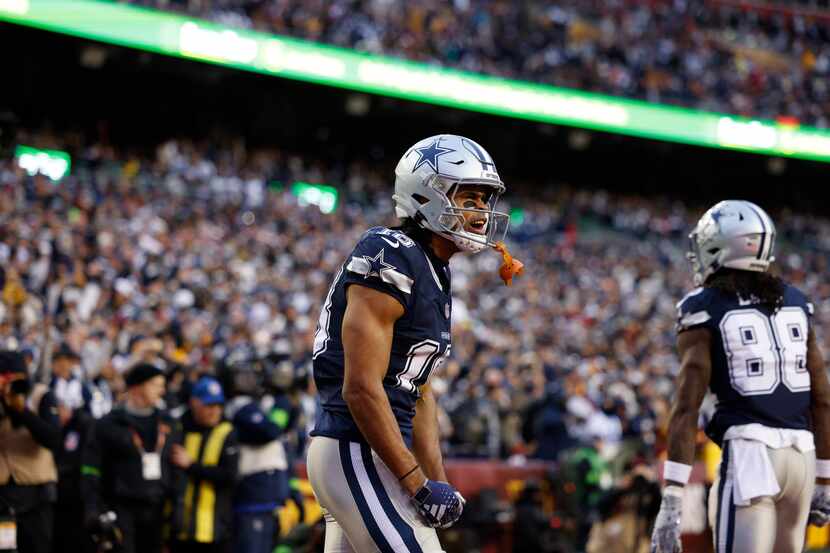 Dallas Cowboys wide receiver Jalen Tolbert (18) celebrates his touchdown reception during...