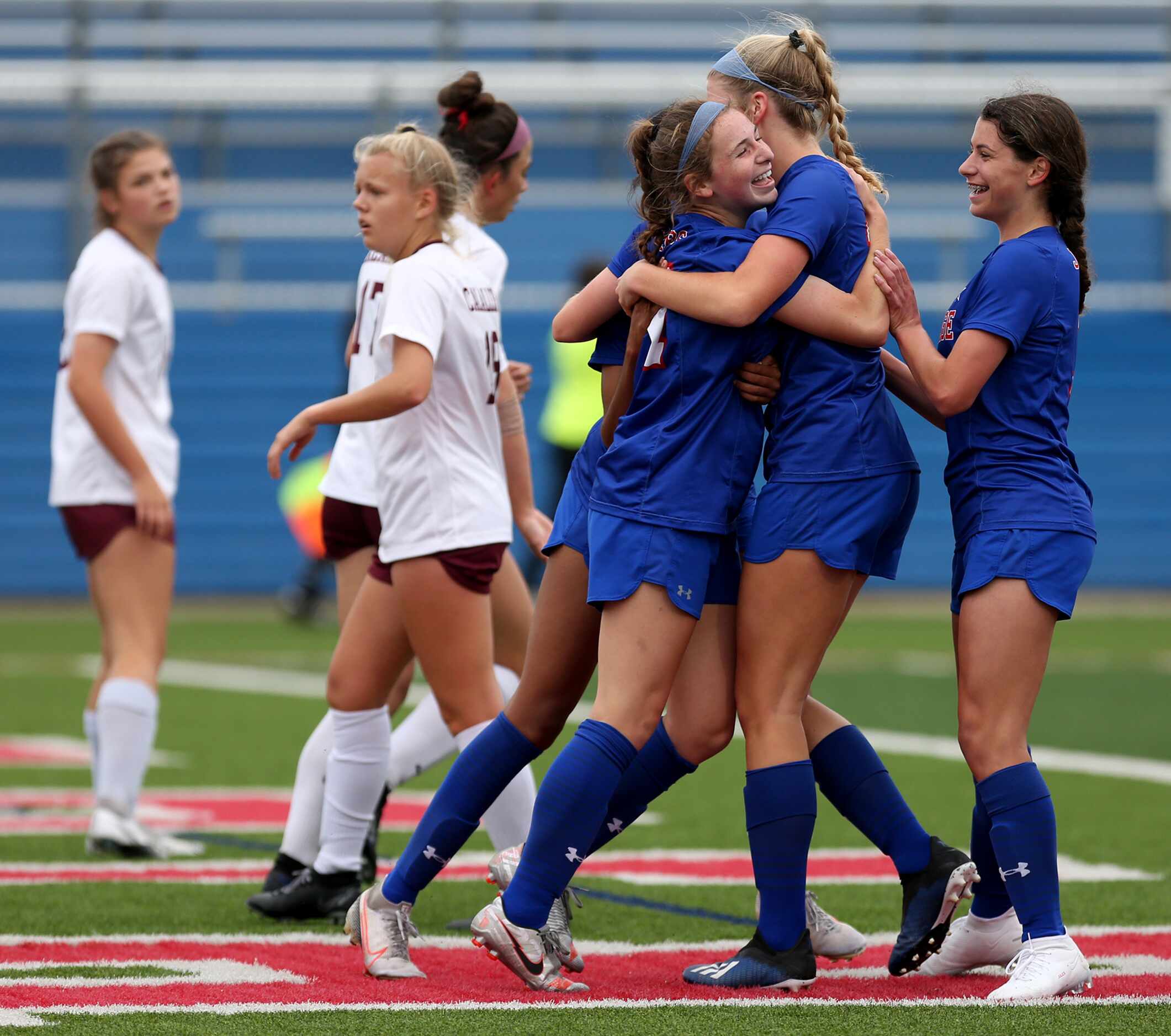 Midlothian Heritage players cheer as they celebrate a goal against Calallen during their UIL...