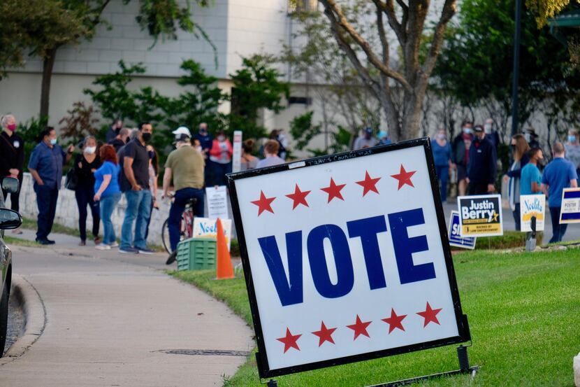 Long lines formed on the first day of early voting in Texas at Ben Hur Shrine Center in...