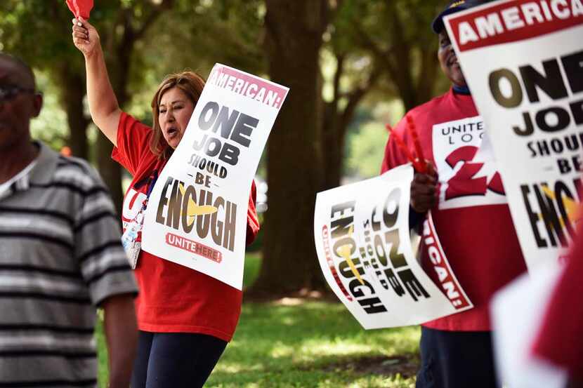 Leticia Gómez, an employee of LSG Sky Chefs, participates in a protest near American...