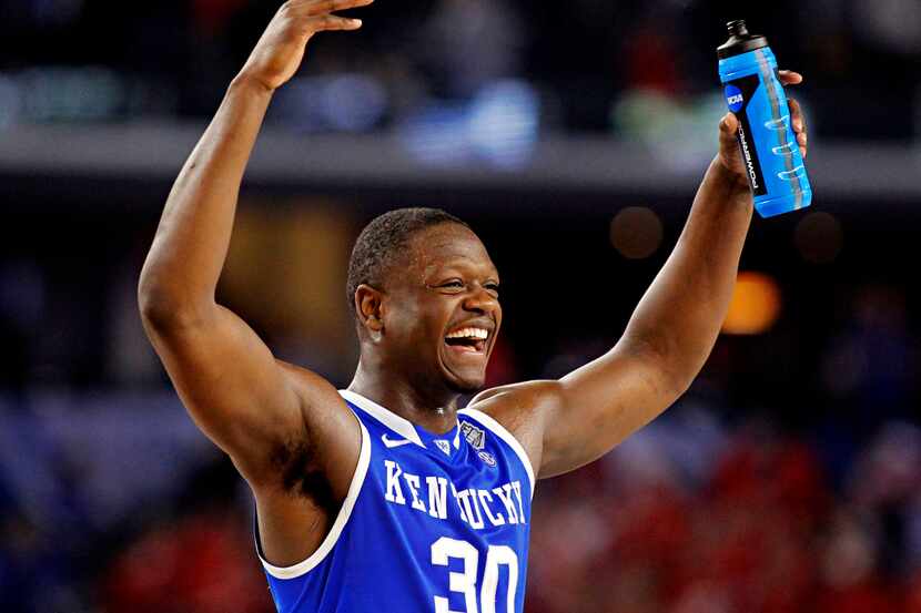 Kentucky Wildcats forward Julius Randle celebrates after a 74-73 win over the Wisconsin...