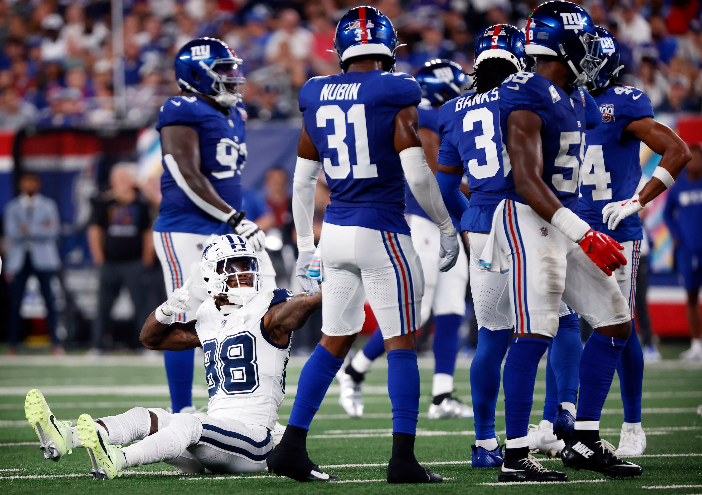 Dallas Cowboys wide receiver CeeDee Lamb (88) celebrates a first down after his first...