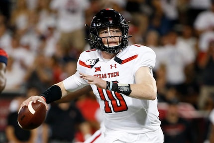 Texas Tech quarterback Alan Bowman (10) looks to pass the ball against Arizona during the...