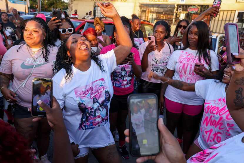 Family and friends of Shaniah Jones, 24, who was fatally shot last week, including her...