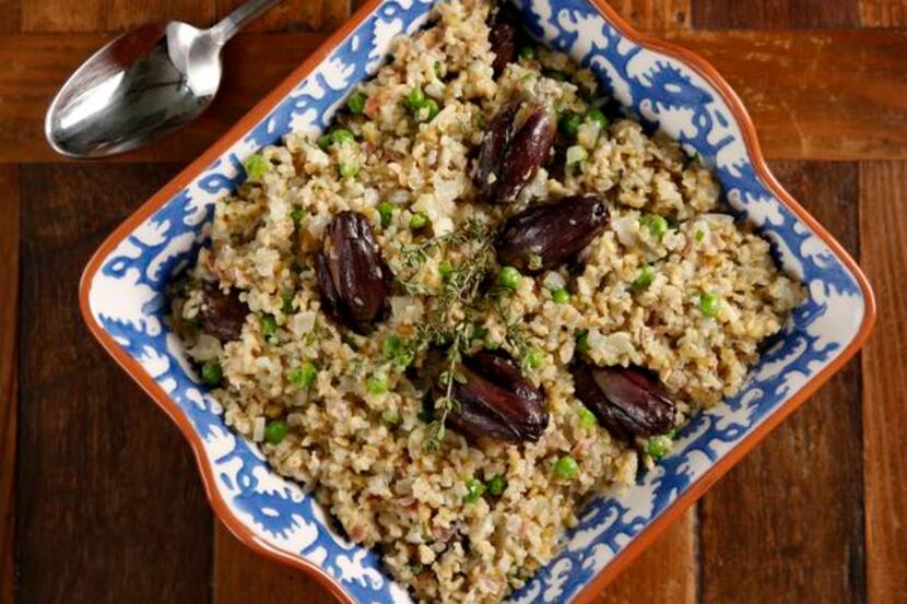 
Freekeh With Peas and Artichokes is enriched with butter, pancetta and Parmigiano-Reggiano.
