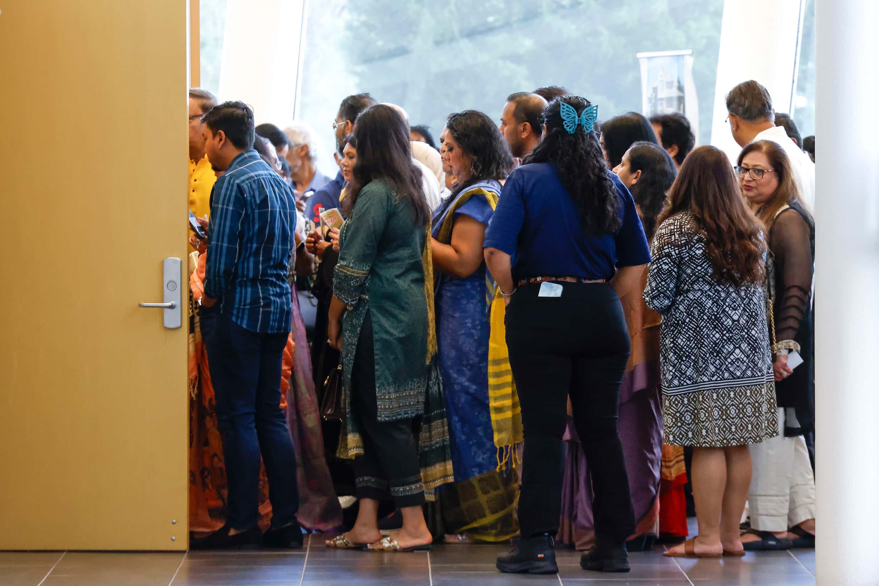 Attendees make their way to the heatre to watch the final show of the play, Shakuntala, on...