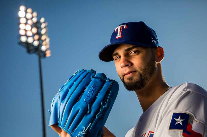 Texas Rangers pitcher Alex Claudio poses for a photo during Spring Training picture day at...