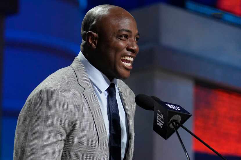 Former football player DeMarcus Ware announces a pick during the second round of the NFL...