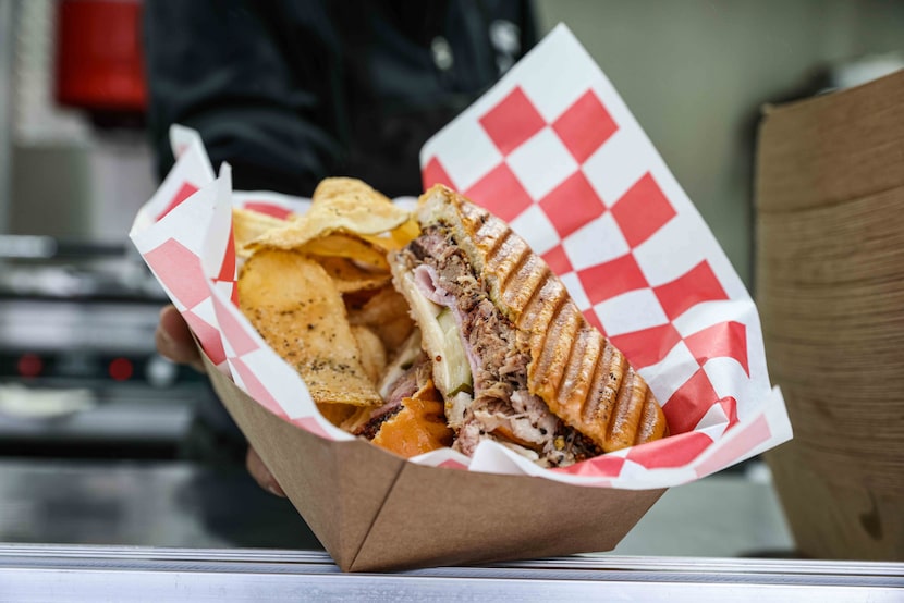 Chef Jordan Savell presents El Cubano, her signature cuban sandwich with smoked pork...