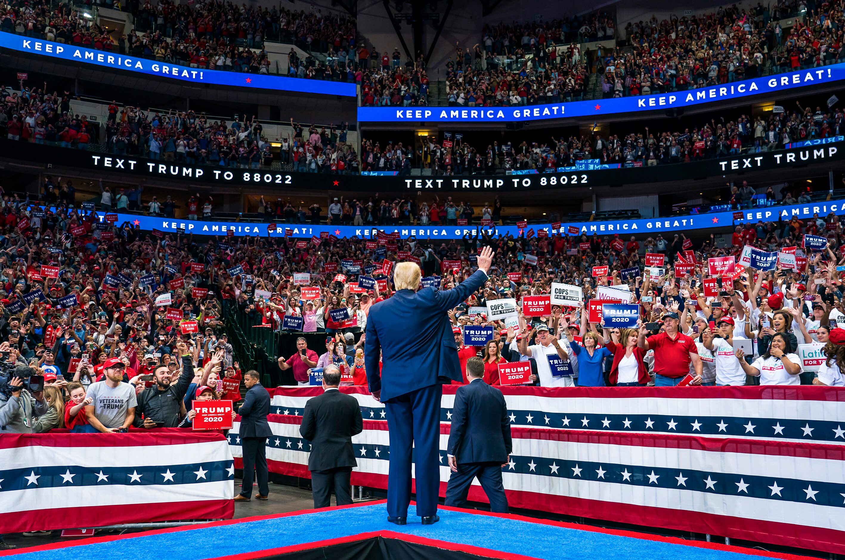 President Donald Trump acknowledges the crowd as he arrives for a campaign rally at the...