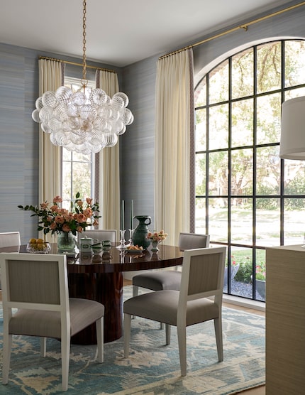 In this dining room designed by Lindley Arthur, the round table shape dictated the design....