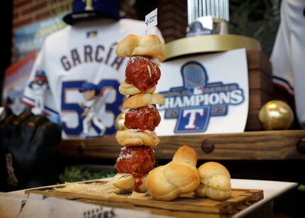 Meatball garlic knot sliders, one of the Texas Rangers' new concessions items in 2024, are...