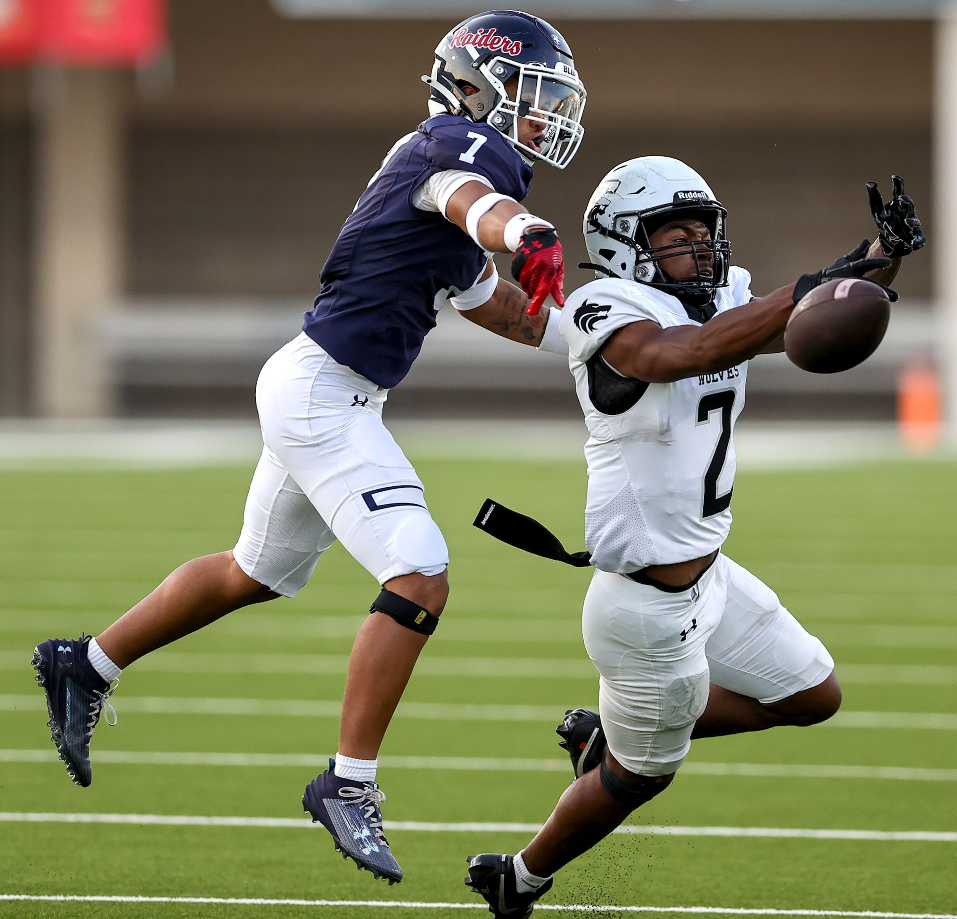 Mansfield Timberview wide receiver Tyler Madison (2) tries to come up with a reception...