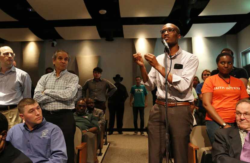 Demarcus Offord speaks in favor of a tax ratification election during a public hearing and...