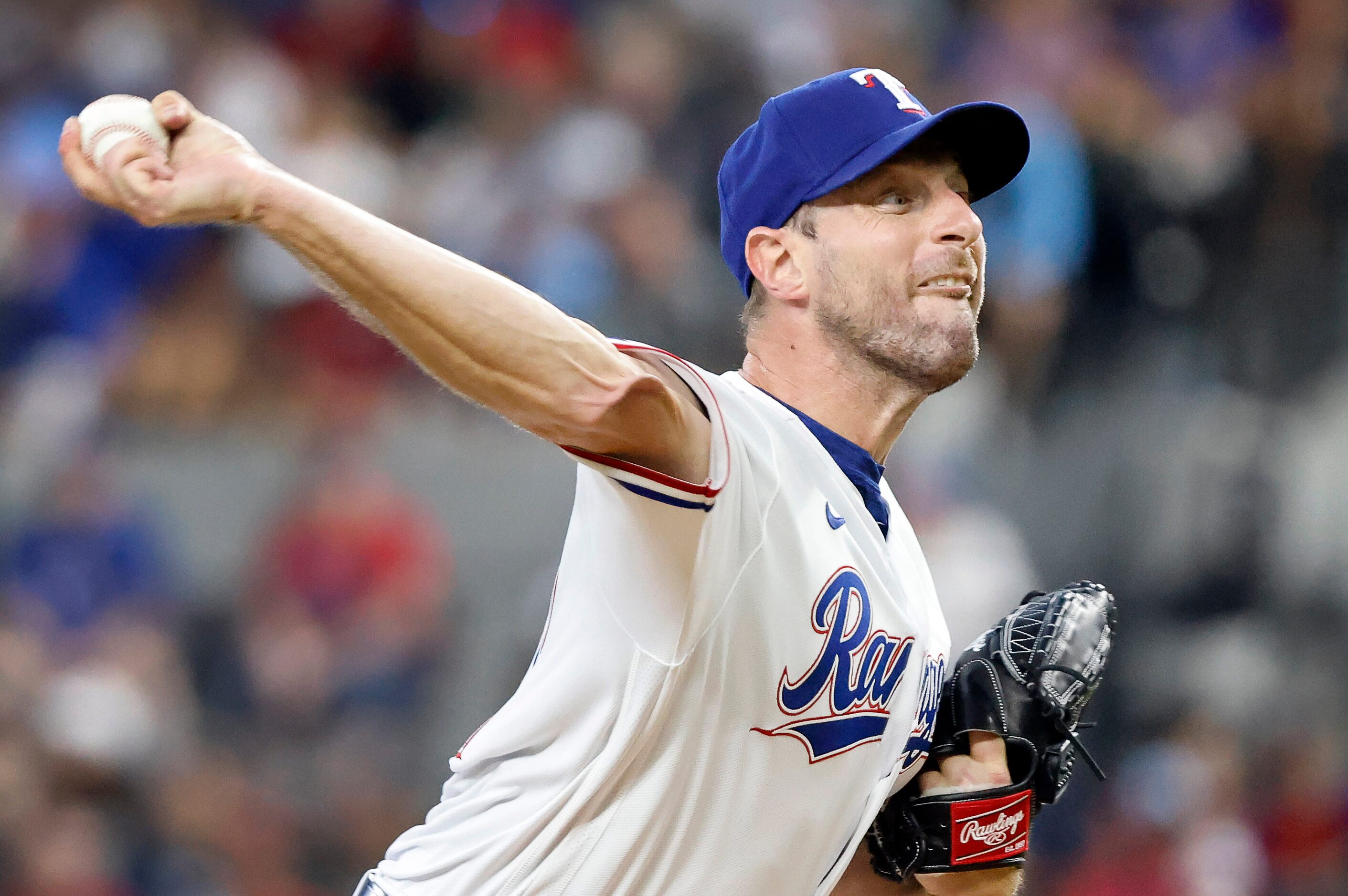 Texas Rangers starting pitcher Max Scherzer (31) throws against the Chicago White Sox during...