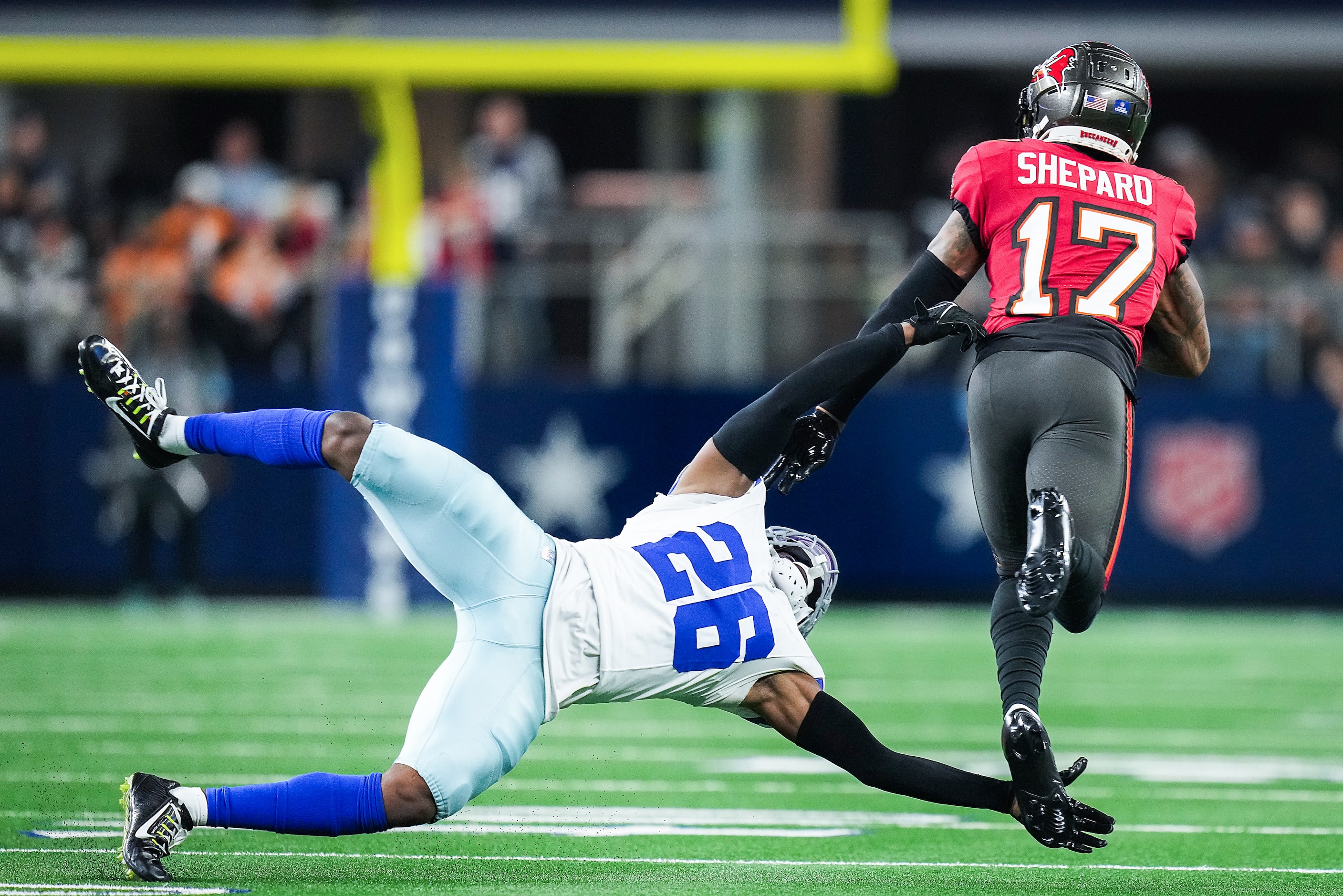 Dallas Cowboys cornerback DaRon Bland (26) dives to get a hand on Tampa Bay Buccaneers wide...