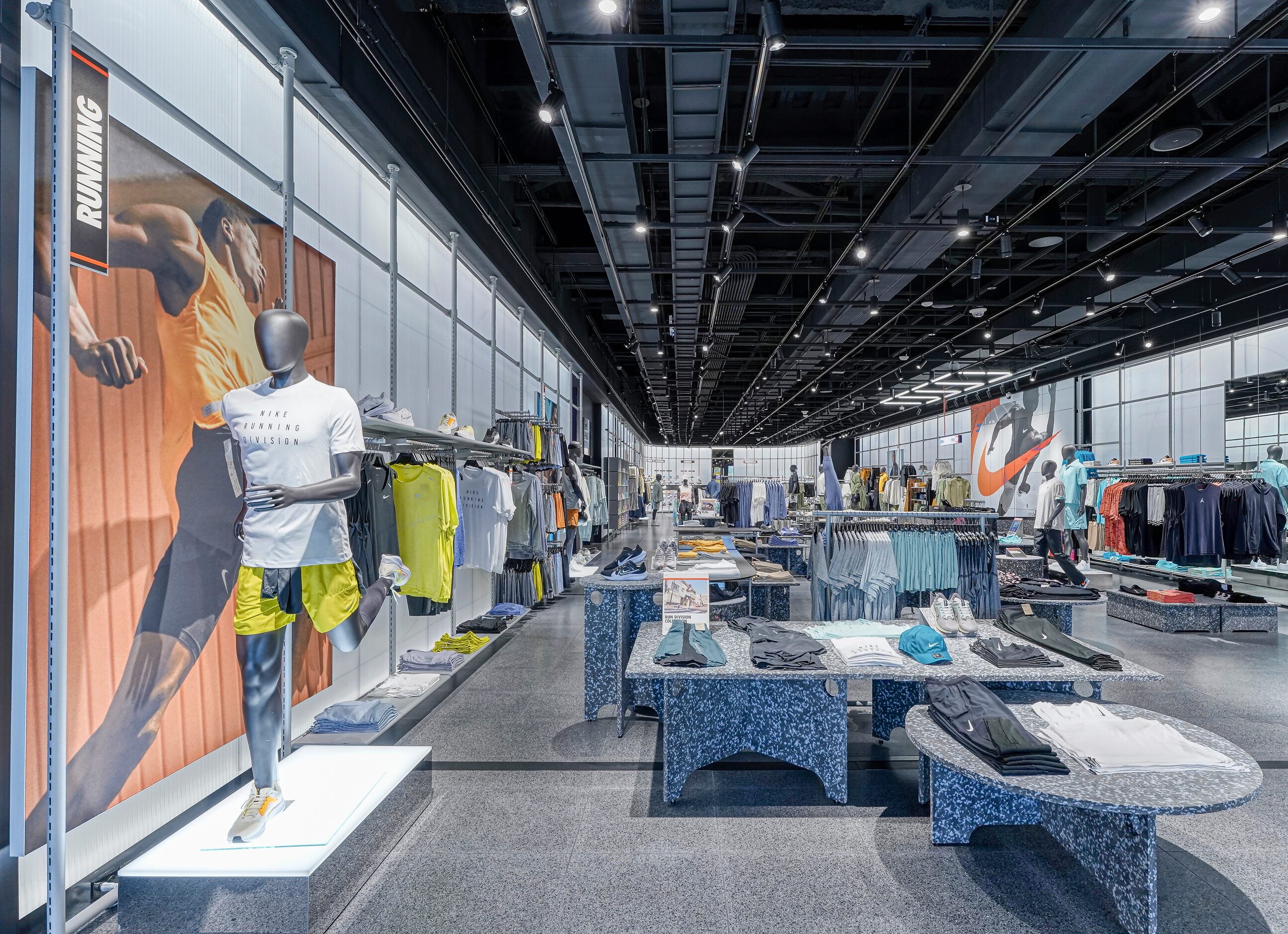 Men's running department in Nike Rise at NorthPark.
                               