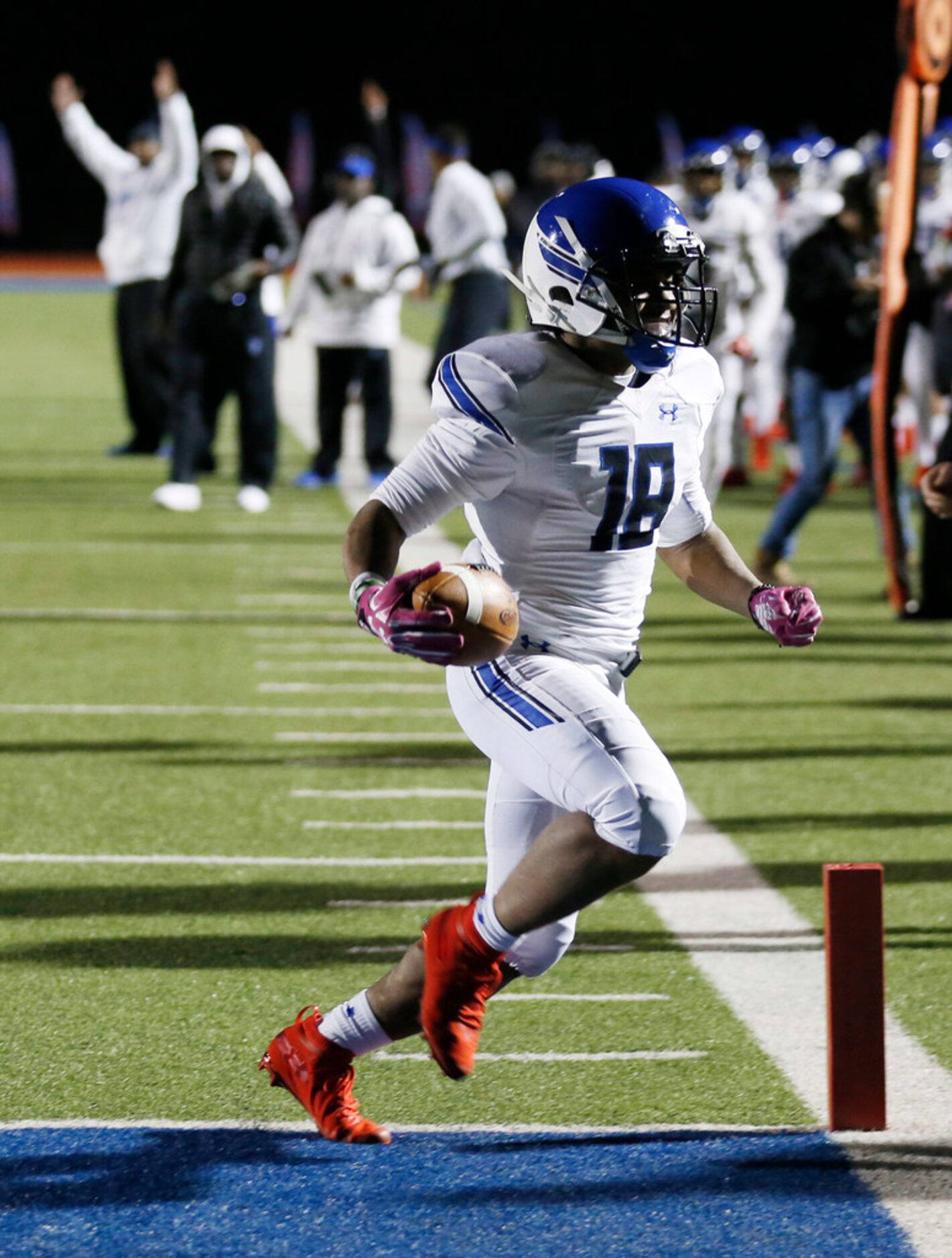 Trinity Christian's Emari Matthews (18) scores a touchdown in a game against Austin Regents...