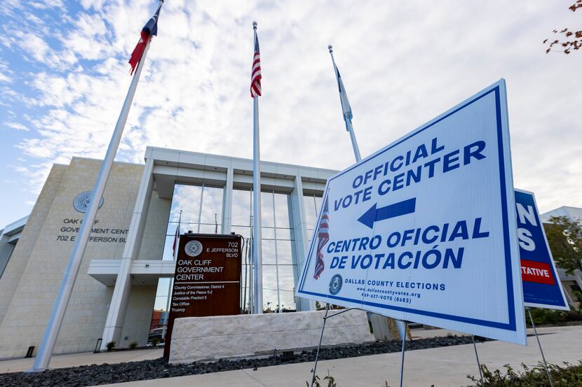 An official vote center sign outside of the Oak Cliff Government Center in Dallas, Tuesday,...