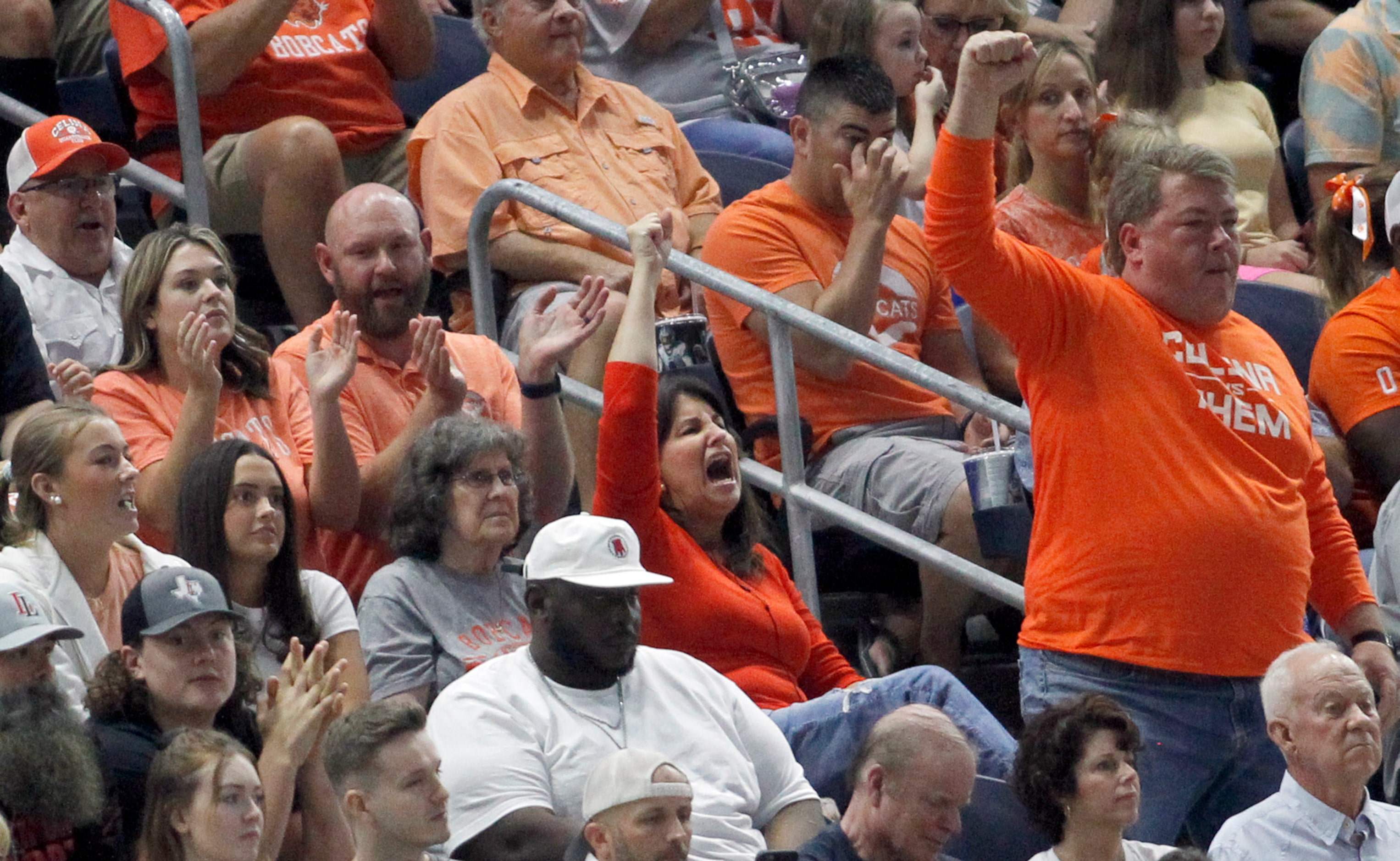 Celina fans react after a defensive stop forced a change of possession during first quarter...