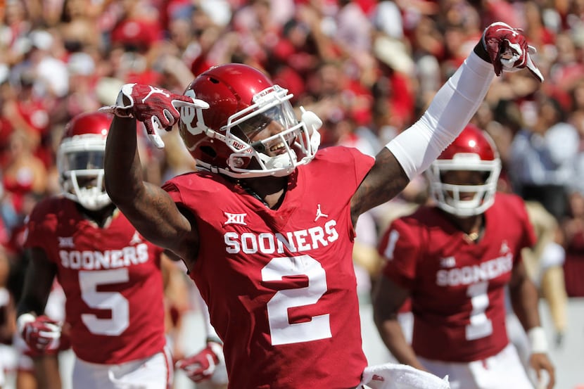 Oklahoma Sooners wide receiver CeeDee Lamb (2) gestures after an OU touchdown in the second...