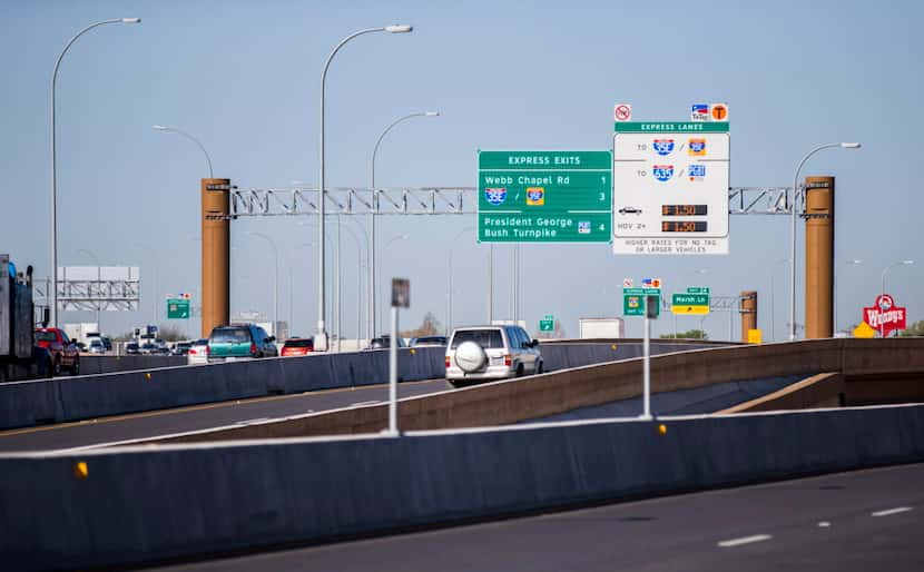 Motorists drive west on LBJ Freeway at one entrance to the TEXpress toll lanes. Although...