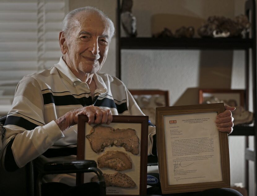 Amateur rock collector John Tackel holds a letter from John Geissman, professor of...