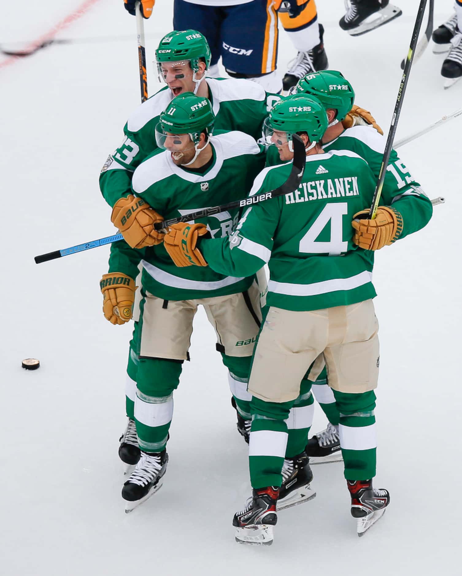 The Dallas Stars celebrate after a goal by Dallas Stars left wing Blake Comeau (15) during...