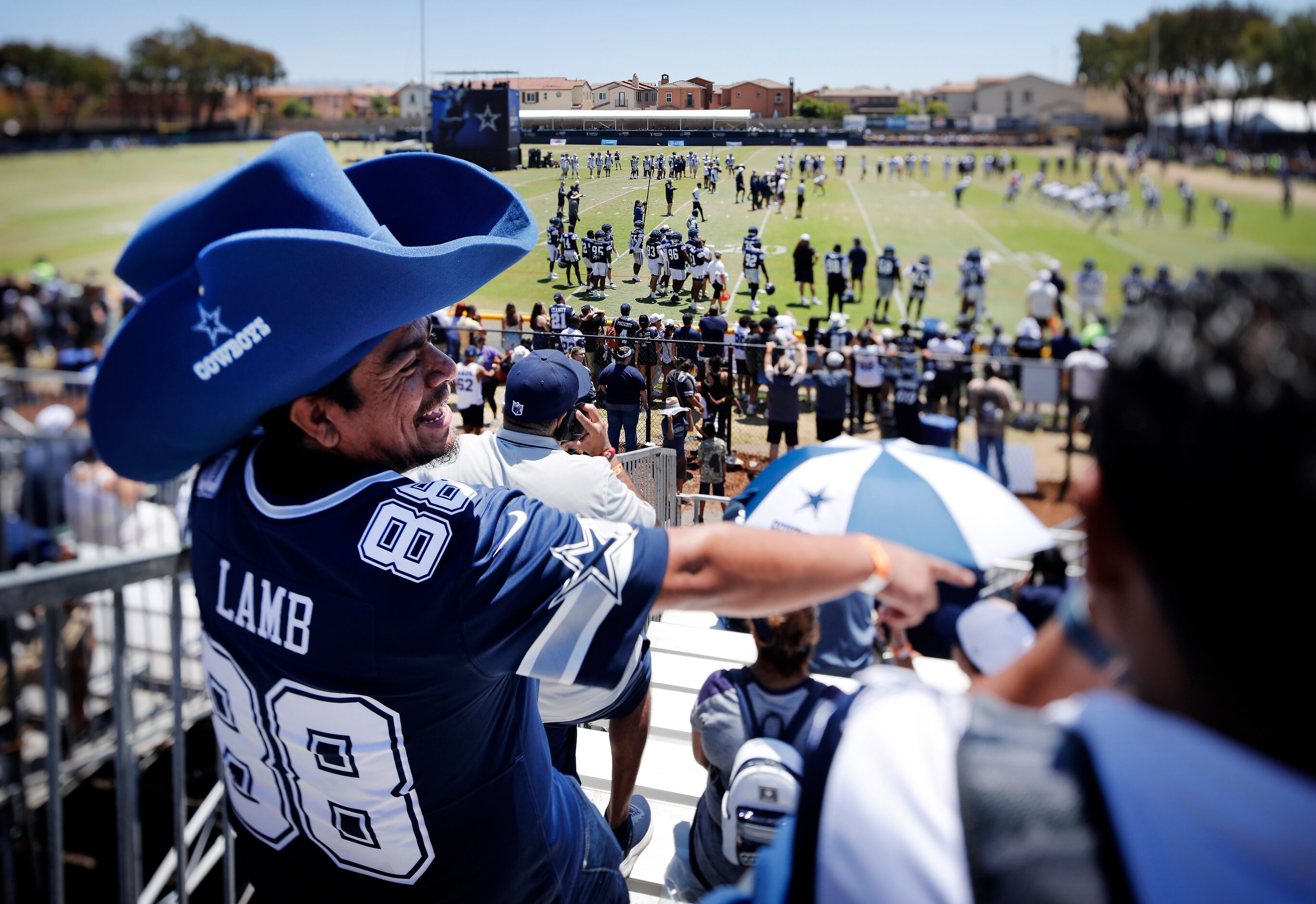 Dallas Cowboys fan Alex Garcia of Long Beach, California donned his styrofoam cowboy hat as...