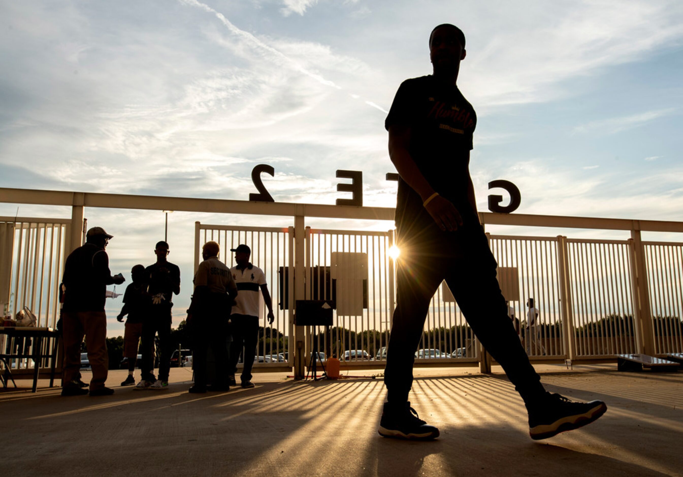 South Oak Cliff fans enter the west gate of John Kincaide Stadium before a high school...