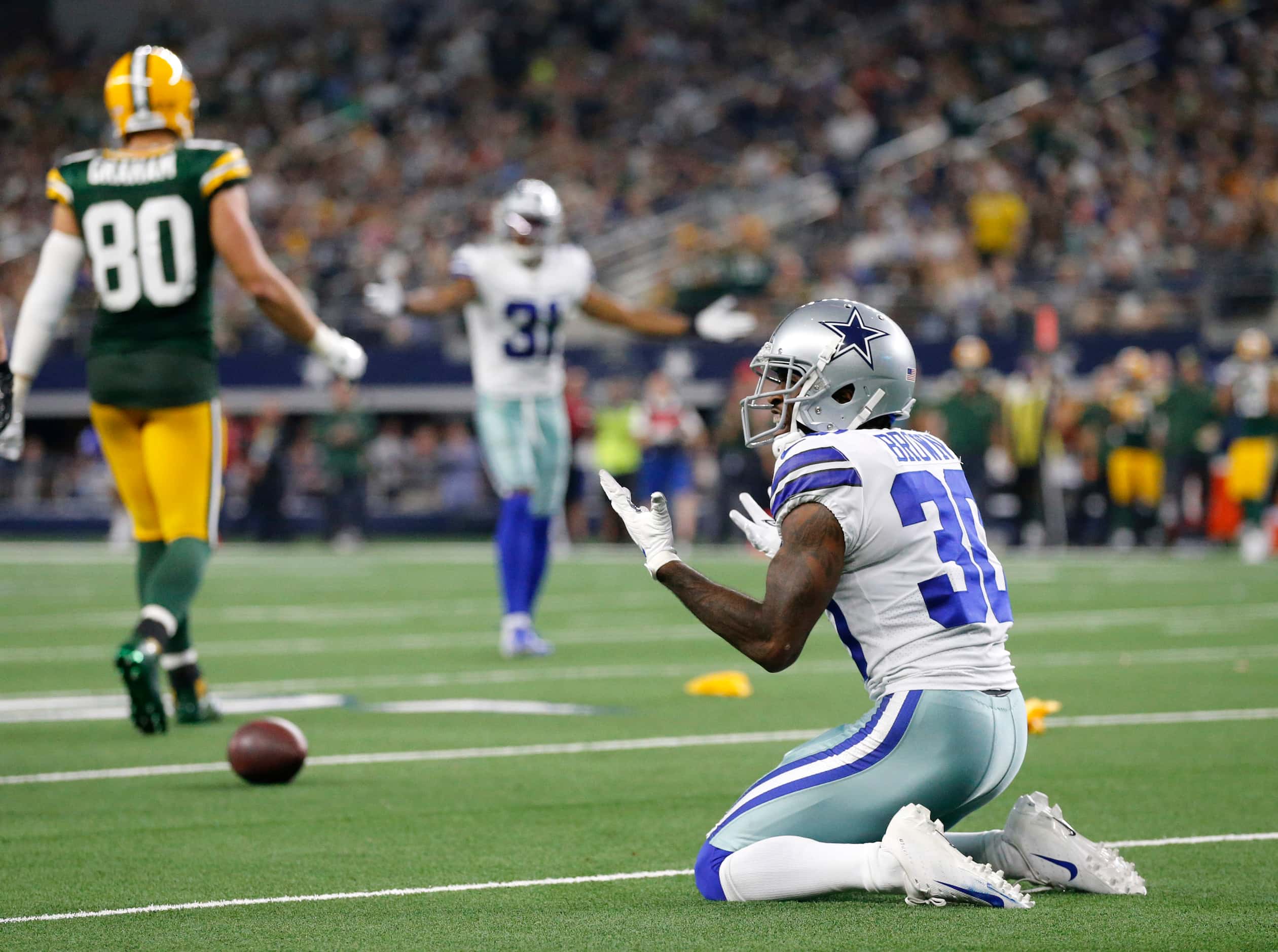 Dallas Cowboys cornerback Anthony Brown (30) reacts after he was called for interference in...