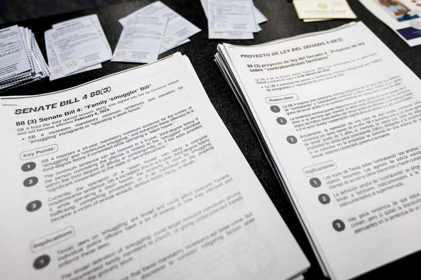 Fliers in English and Spanish describe how Senate Bill 4, the “Family Smuggler Bill,” works...