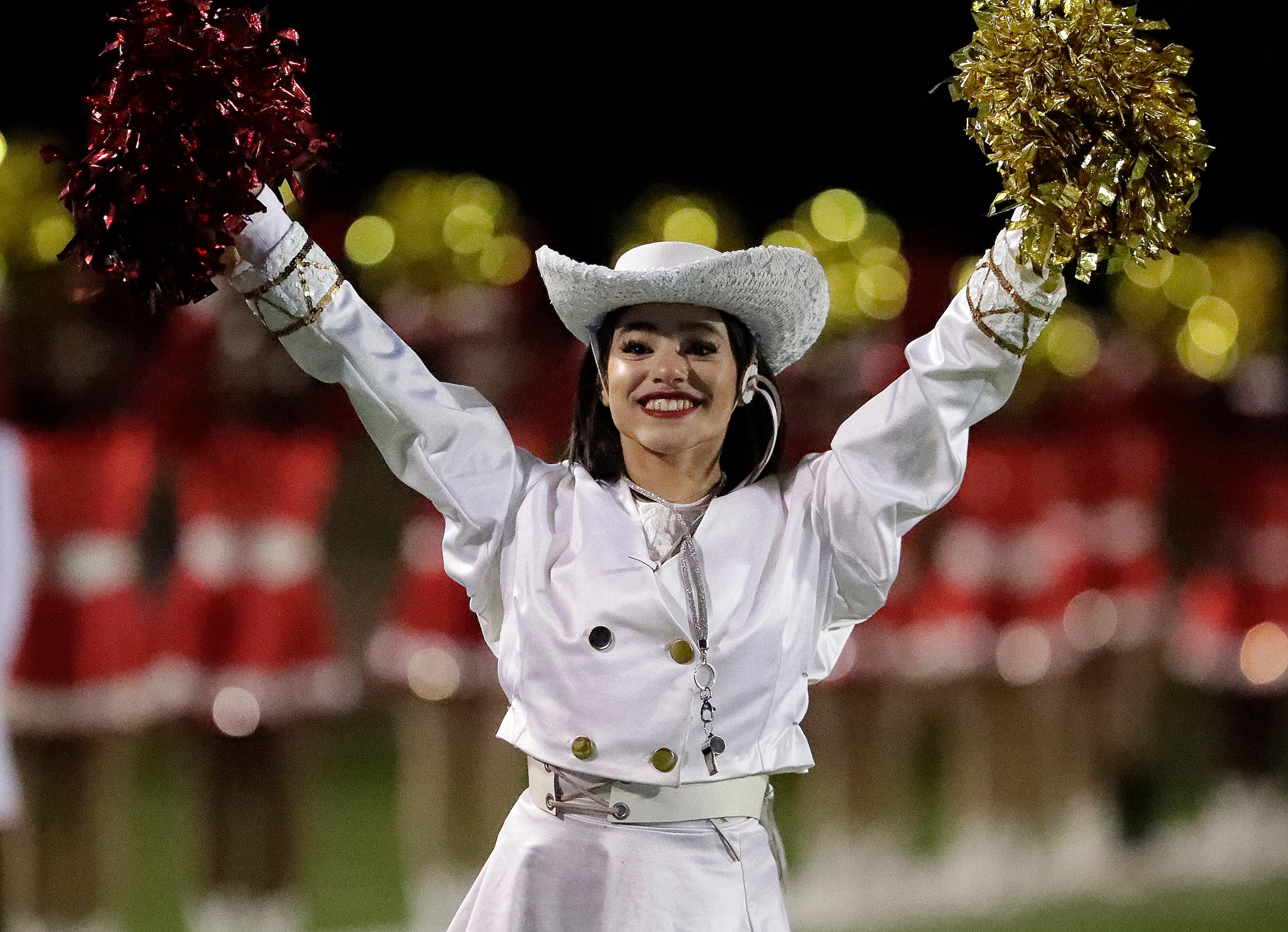 Madi Littleton, captain of the South Grand Pairie High School Cheyannes drill team, stands...