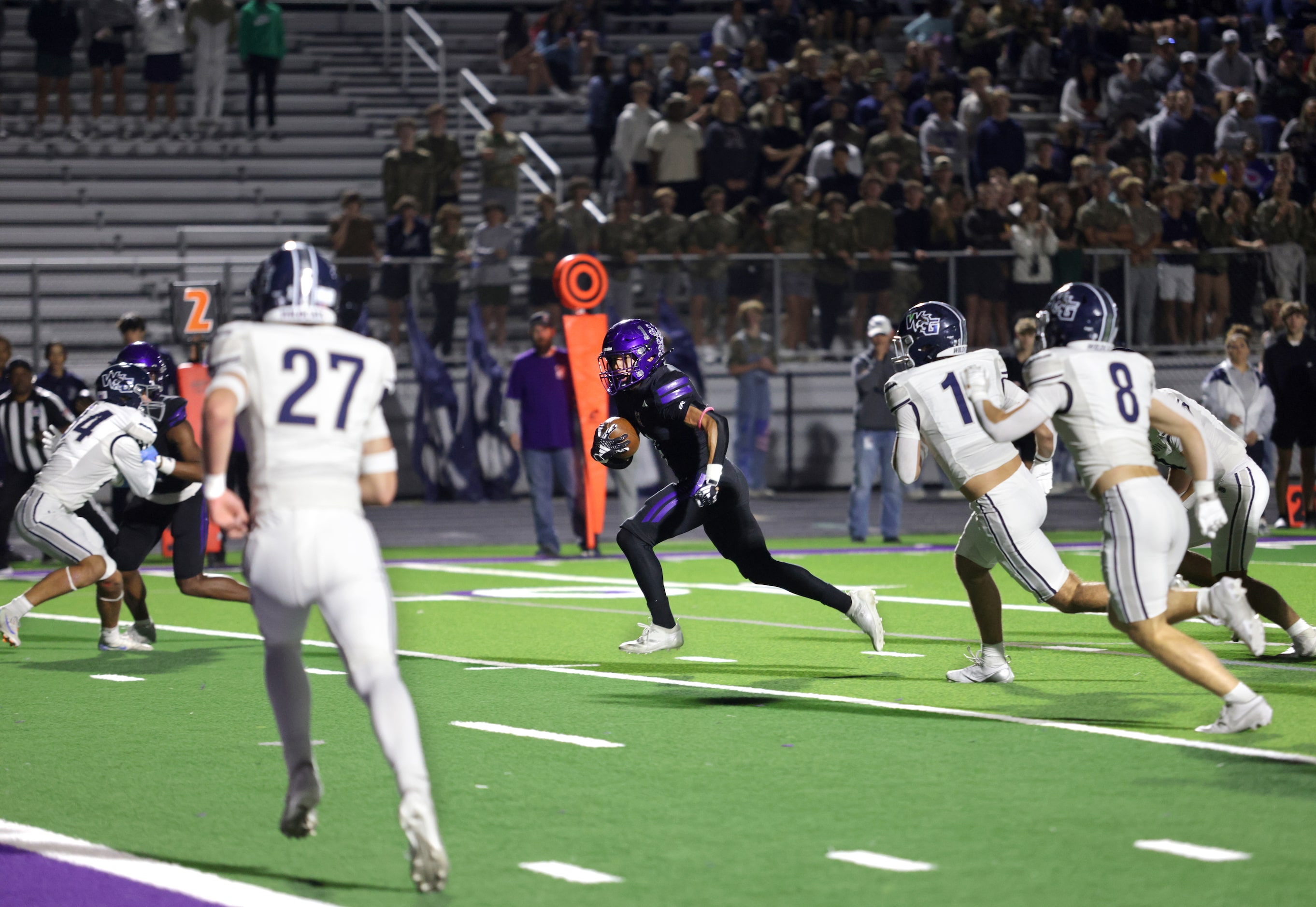 Anna player #1 Edward Chumley runs in for a touchdown during the Prosper Walnut Grove High...